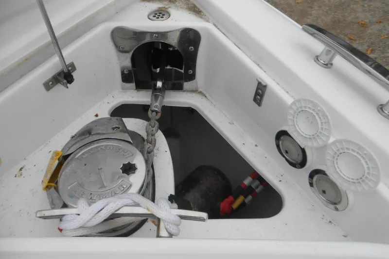 Slide: The Image of Anchor compartment of 2020 Cobalt A36BR boat with winch and chain. - 54
