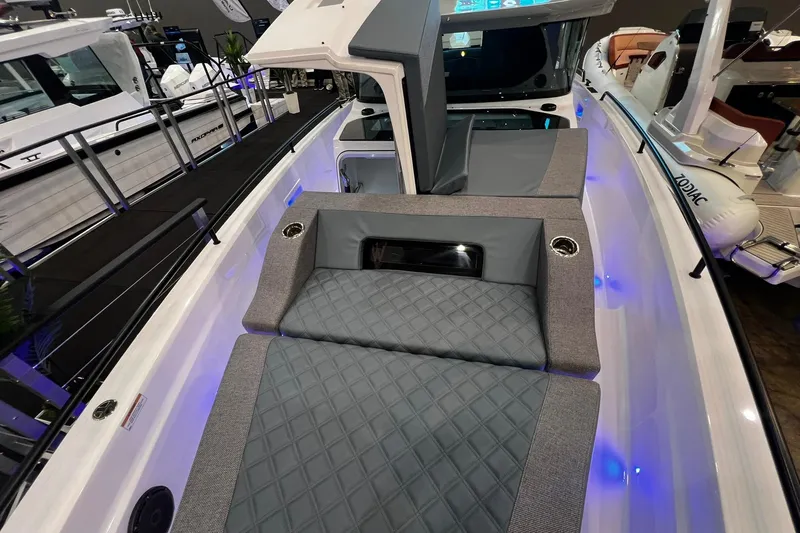 Slide: The Image of 2026 Axopar 37 XC Cross Cabin with luxurious seating and modern design. - 2