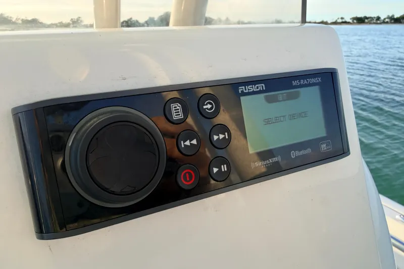 Slide: The Image of Fusion MS-RA70NSX stereo system on 2023 Key West 219 FS boat dashboard. - 30