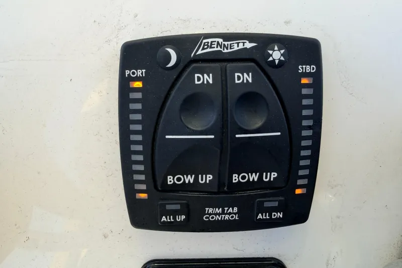 Slide: The Image of Bennett trim tab control panel on 2023 Key West 219 FS boat. - 32