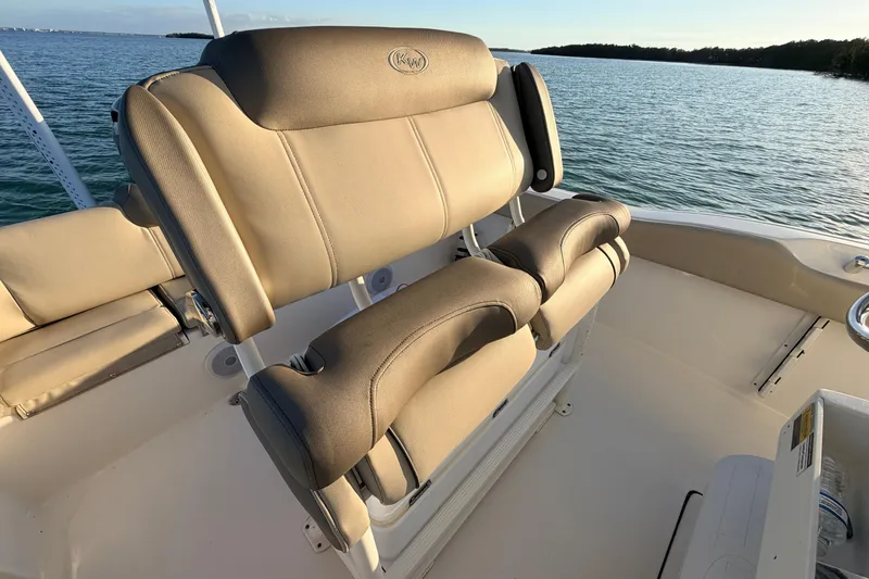 Slide: The Image of 2023 Key West 219 FS boat seats with ocean view in background. - 36