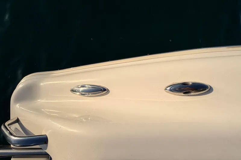 Slide: The Image of 2023 Key West 219 FS boat deck with chrome fittings and railing. - 48