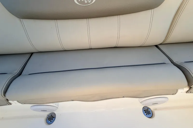 Slide: The Image of 2023 Key West 219 FS boat seat with speakers and drainage vents. - 53