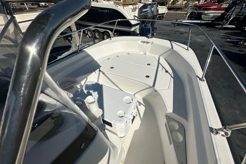 Slide: The Image of 2021 Boston Whaler 170 Montauk boat interior with seating and storage compartments. - 8