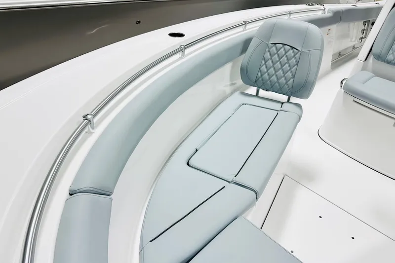 Slide: The Image of 2026 Sportsman Open 302 Center Console with luxurious seating and sleek design. - 10