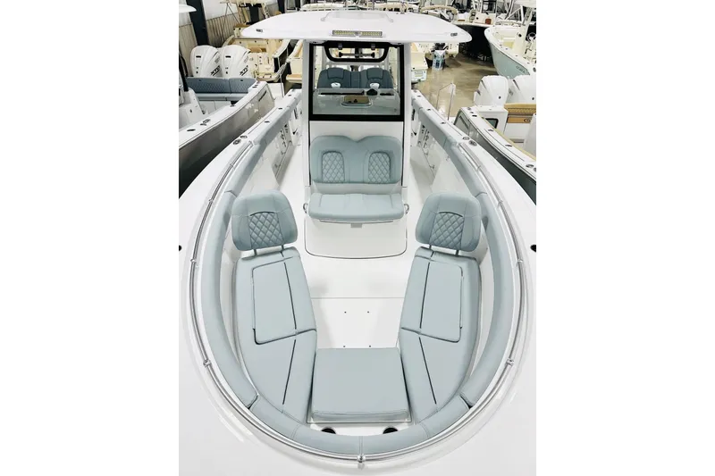 Slide: The Image of 2026 Sportsman Open 302 Center Console boat with spacious seating and modern design. - 11
