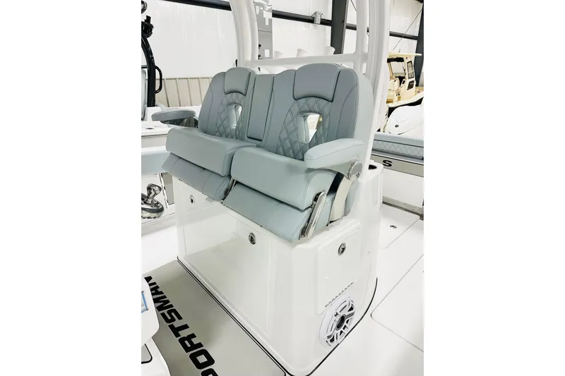 Slide: The Image of 2026 Sportsman Open 302 Center Console boat with luxurious seating and modern design. - 4