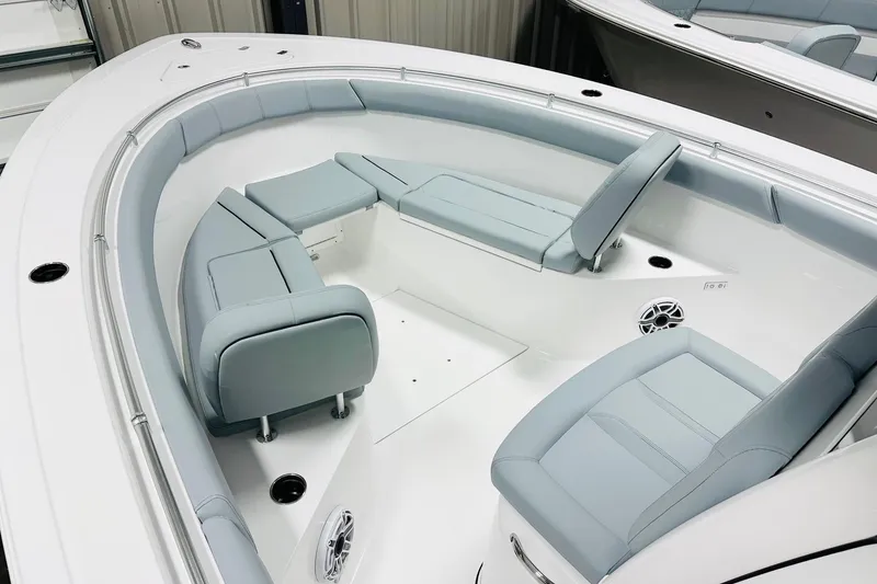 Slide: The Image of 2026 Sportsman Open 302 Center Console boat with spacious seating and modern design. - 9