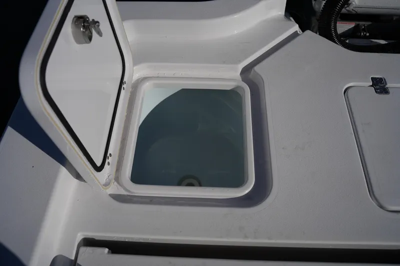 Slide: The Image of Open storage compartment on 2023 Sportsman Masters 267 Bay Boat deck. - 19