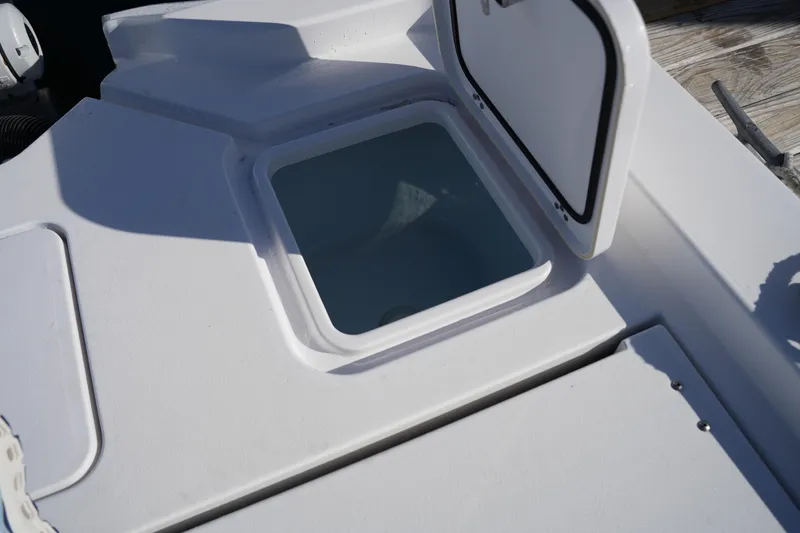 Slide: The Image of Open storage compartment on 2023 Sportsman Masters 267 Bay Boat deck. - 21