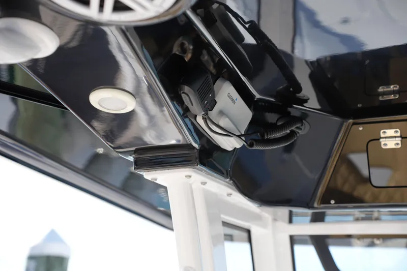 Slide: The Image of 2023 Sportsman Masters 267 Bay Boat interior with Garmin electronics and sleek design. - 33