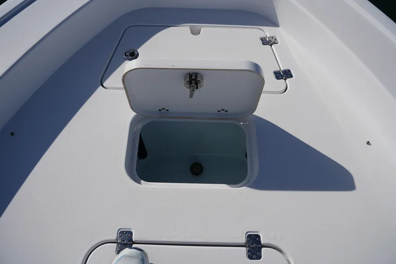 Slide: The Image of 2023 Sportsman Masters 267 Bay Boat livewell compartment with open lid. - 44