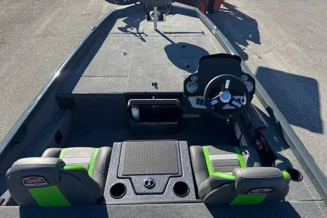 Slide: The Image of 2025 Ranger RT198P boat interior with steering wheel and seating, featuring green accents. - 10