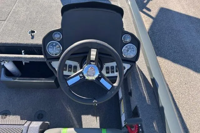 Slide: The Image of 2025 Ranger RT198P boat dashboard with steering wheel and instrument panel. - 11