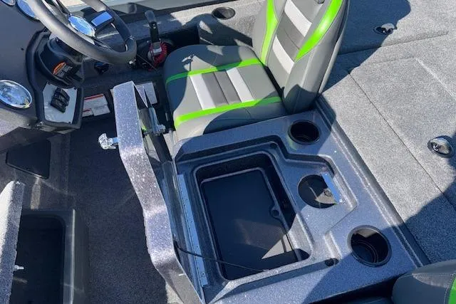 Slide: The Image of 2025 Ranger RT198P boat interior with gray and green seating, storage compartments, and cup holders. - 16
