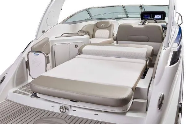 Slide: The Image of 2026 Crownline 270 CR boat interior with luxurious seating and modern dashboard. - 11