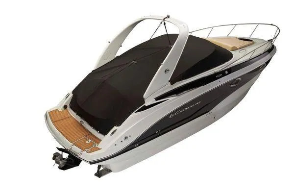 Slide: The Image of 2026 Crownline 270 CR boat with sleek design and black cover, rear view. - 3