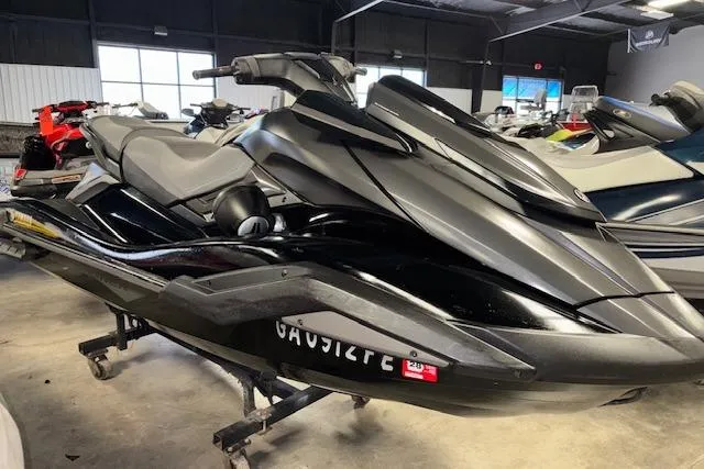 The Image of 2020 Yamaha WaveRunner FX Cruiser SVHO in showroom, sleek black design. - 1