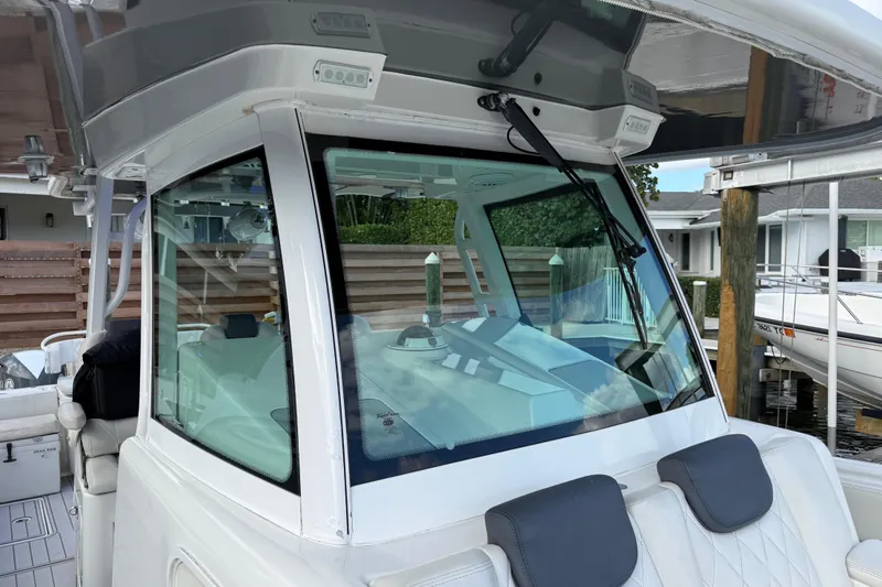 Slide: The Image of 2018 HCB 39 Speciale boat with sleek windshield and modern design. - 15