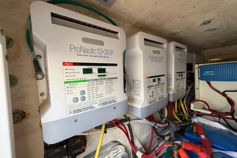 Slide: The Image of Electrical system with ProNautic chargers in a 2018 HCB 39 Speciale boat. - 20