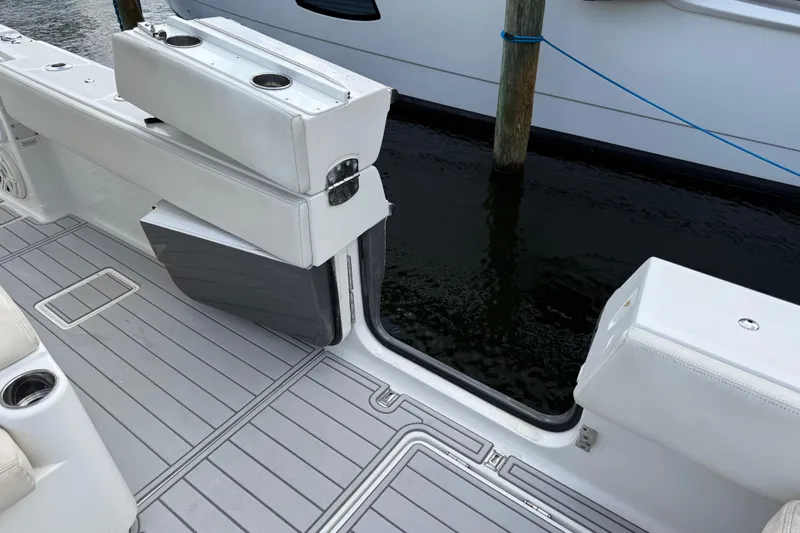 Slide: The Image of 2018 HCB 39 Speciale boat interior with open side door and sleek seating. - 21