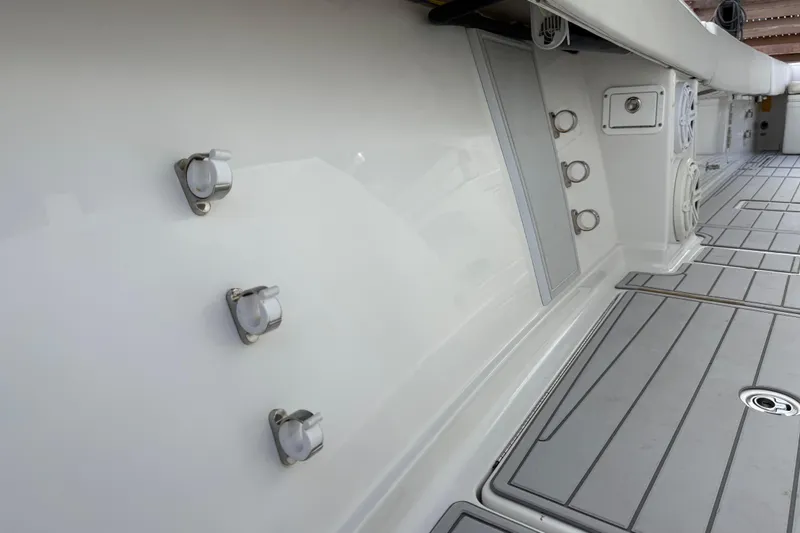 Slide: The Image of 2018 HCB 39 Speciale boat interior with sleek white finish and modern fixtures. - 25