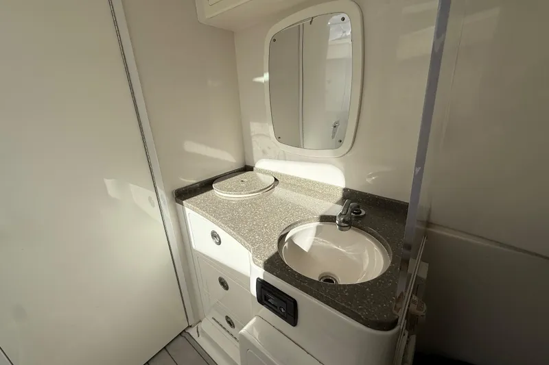 Slide: The Image of Compact bathroom in 2018 HCB 39 Speciale boat with sink and mirror. - 28