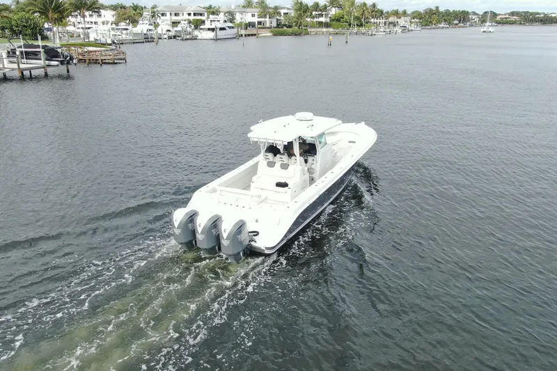 Slide: The Image of 2018 HCB 39 Speciale boat cruising on a calm waterway. - 33