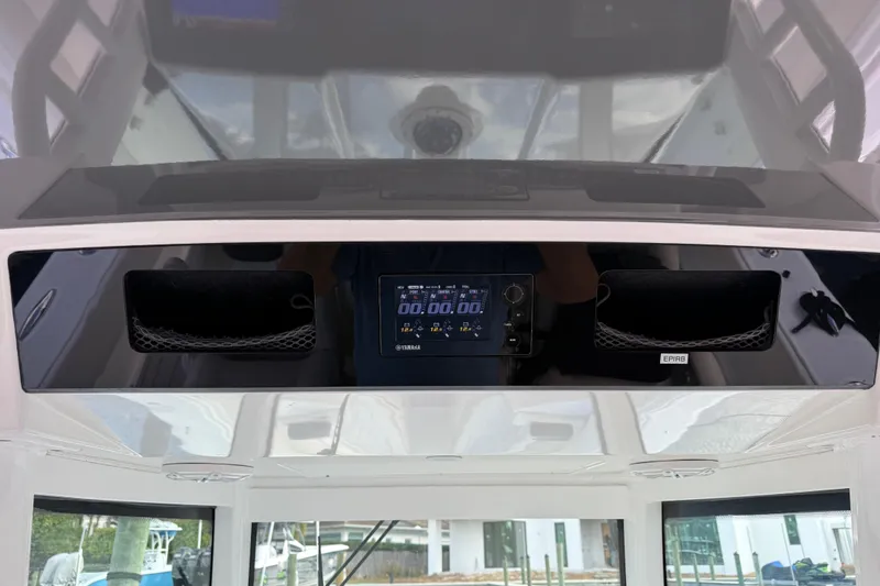 Slide: The Image of 2018 HCB 39 Speciale dashboard with Yamaha display and storage compartments. - 7