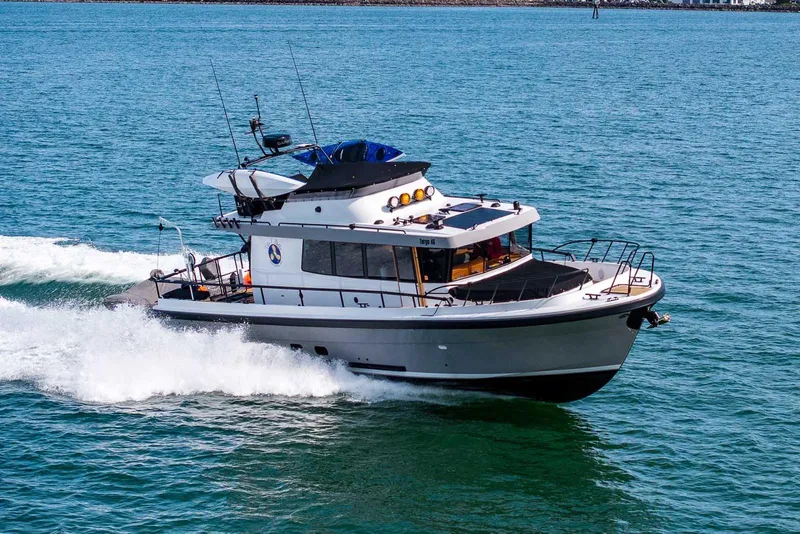 The Image of 2025 Targa 46 boat cruising on open water, showcasing sleek design and performance. - 0