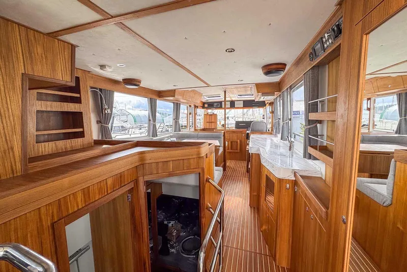 Slide: The Image of Luxurious interior of 2025 Targa 46 yacht with wooden finishes and modern amenities. - 12