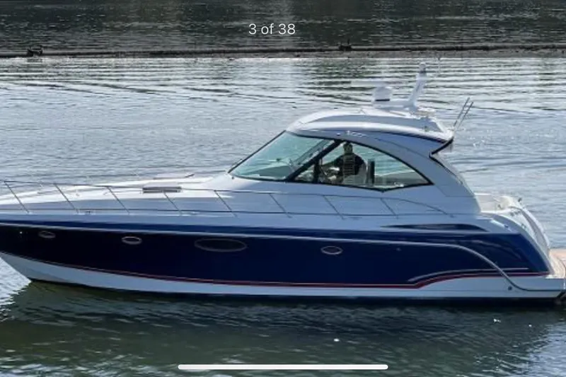 Slide: The Image of 2008 Formula 45 Yacht cruising on calm waters, side view. - 3