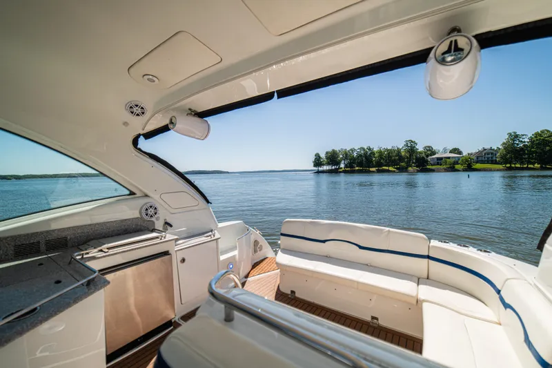 Slide: The Image of Luxurious 2008 Formula 45 Yacht interior with scenic lake view and elegant seating. - 31