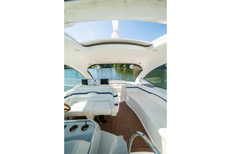Slide: The Image of Interior view of a 2008 Formula 45 Yacht with white seating and wooden flooring. - 46