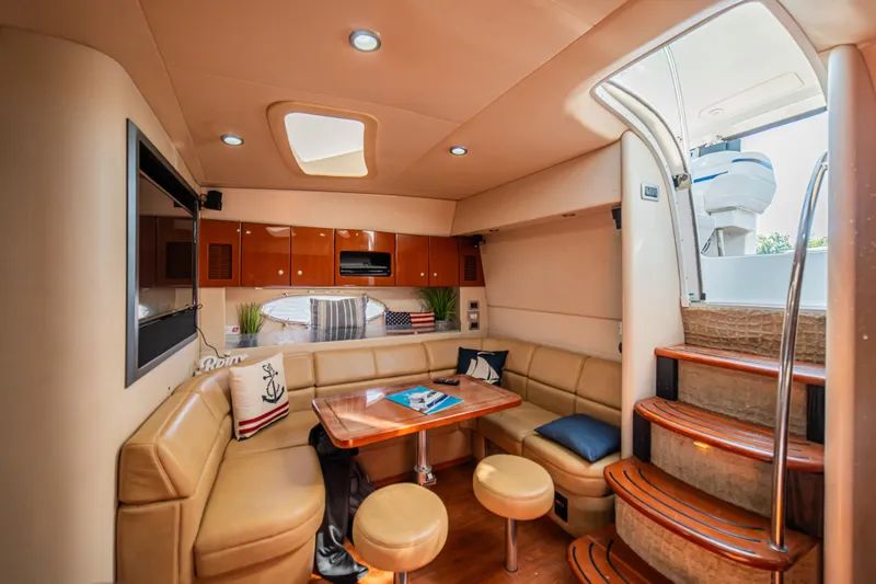 Slide: The Image of Luxurious interior of a 2008 Formula 45 Yacht with elegant seating and modern amenities. - 61