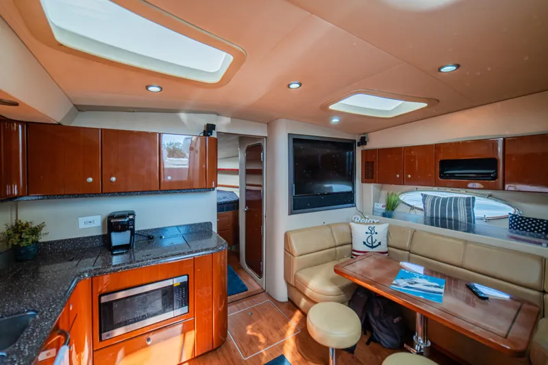Slide: The Image of Luxurious interior of a 2008 Formula 45 Yacht with modern kitchen and cozy seating area. - 63