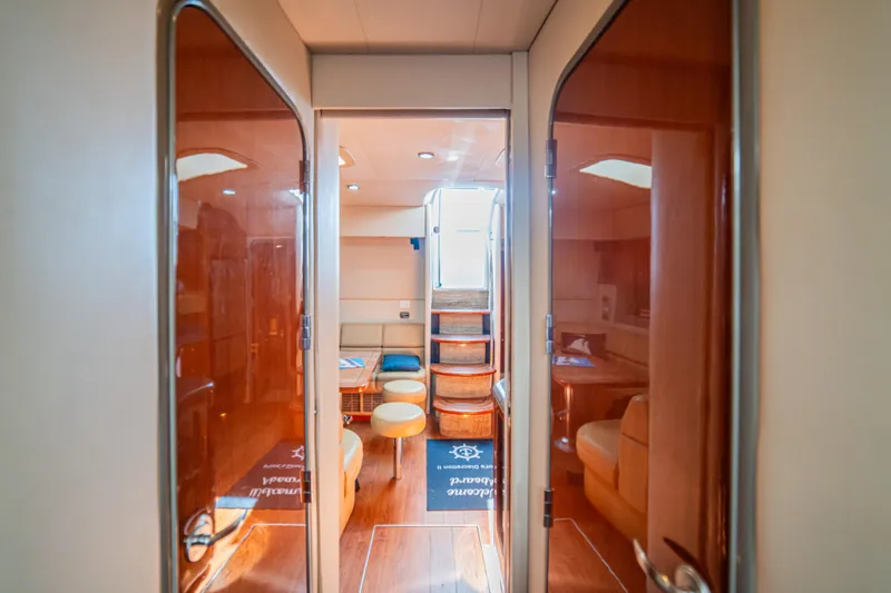 Slide: The Image of Interior of 2008 Formula 45 Yacht with wooden finishes and seating area. - 89
