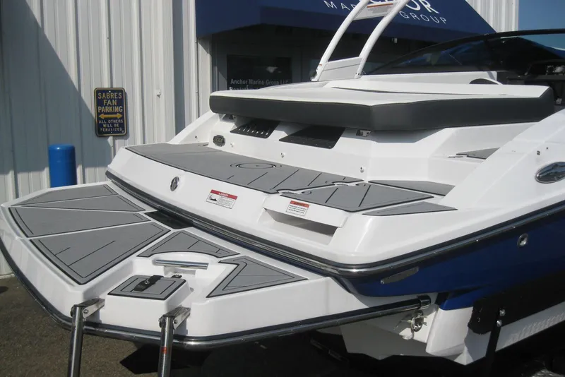 Slide: The Image of 2024 Monterey M-22 boat on trailer at Anchor Marine Group dealership. - 2