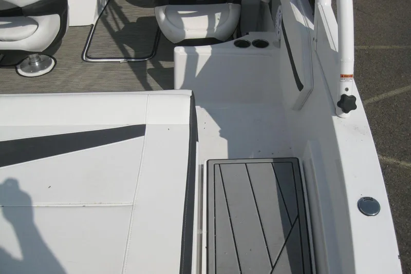 Slide: The Image of 2024 Monterey M-22 boat interior with modern seating and dashboard design. - 5
