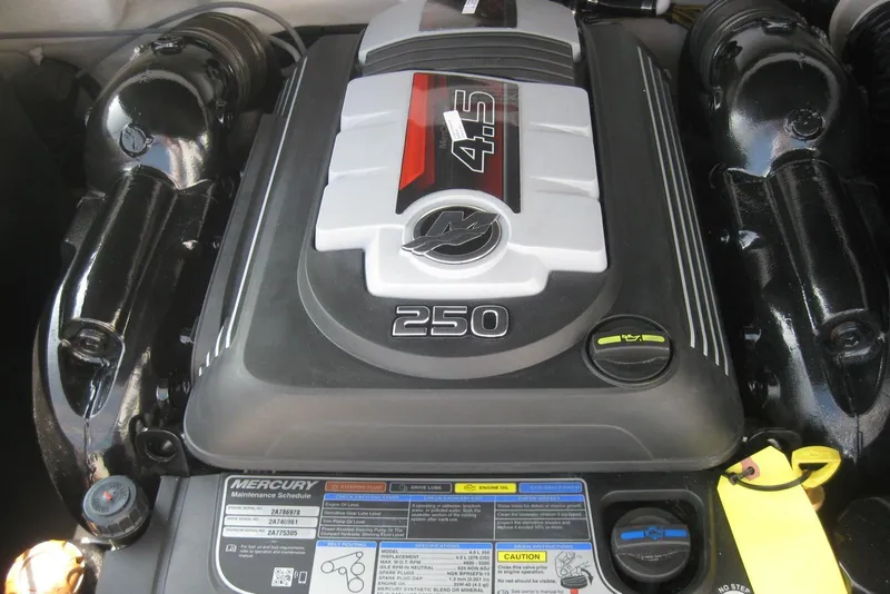 Slide: The Image of White Igloo cooler inside 2024 Monterey M-22 boat storage compartment. - 9