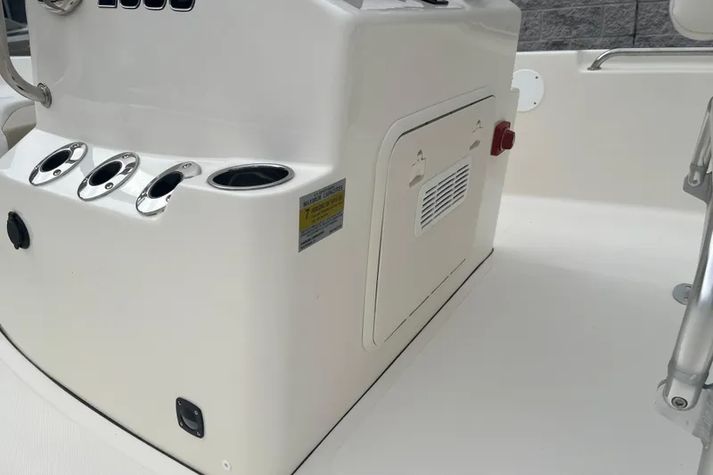 Slide: The Image of 2026 Bulls Bay 2000 boat console with rod holders and storage compartment. - 15