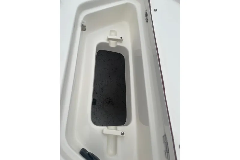 Slide: The Image of Open storage compartment on a 2026 Bulls Bay 2000 boat, showcasing interior design. - 23