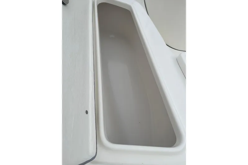 Slide: The Image of Bulls Bay 2000 boat storage compartment, 2026 model, featuring sleek white interior design. - 24
