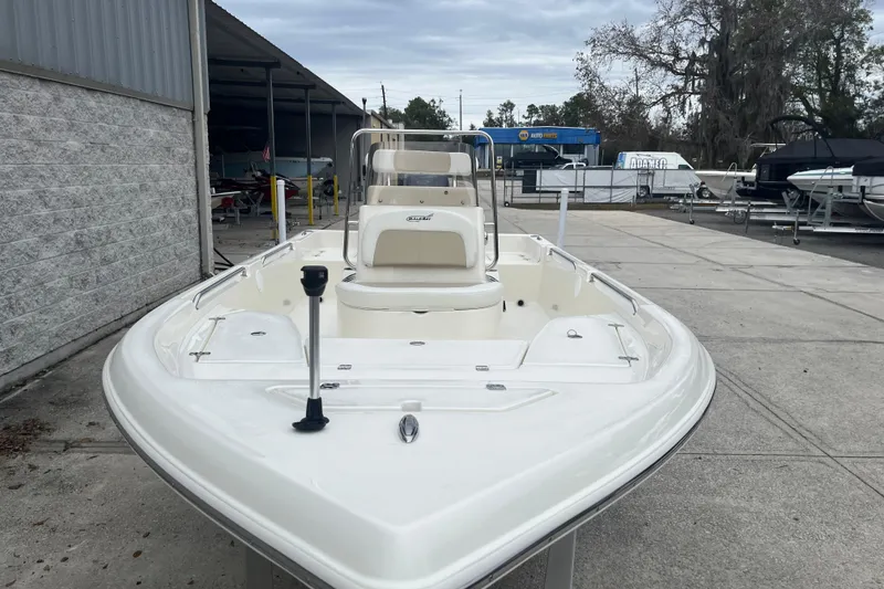 Slide: The Image of 2026 Bulls Bay 2000 boat in a marina, showcasing sleek design and spacious deck. - 6