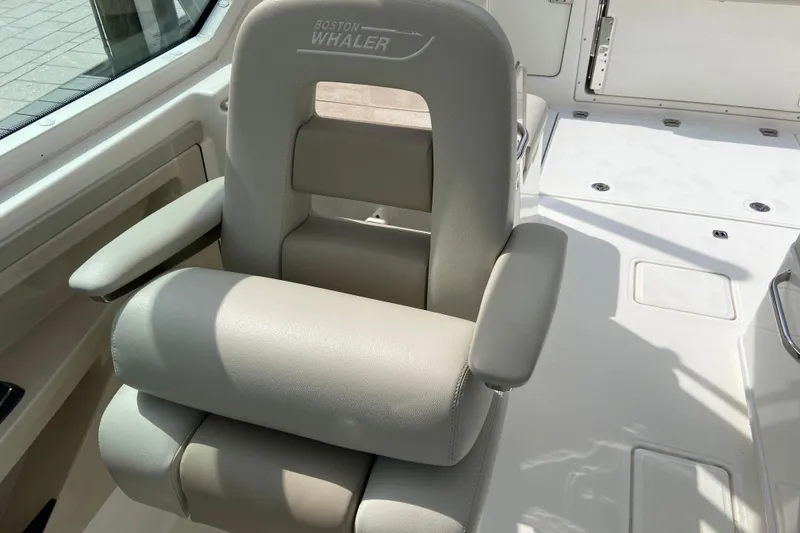 Slide: The Image of Luxury seating on 2021 Boston Whaler 280 Vantage boat, featuring premium upholstery. - 11