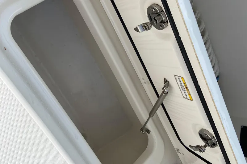 Slide: The Image of Open storage compartment on a 2021 Boston Whaler 280 Vantage boat. - 30