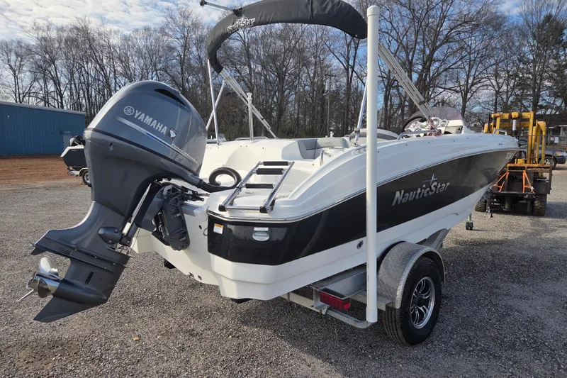 Slide: The Image of 2022 NauticStar 193 SC boat with Yamaha outboard motor on trailer. - 4