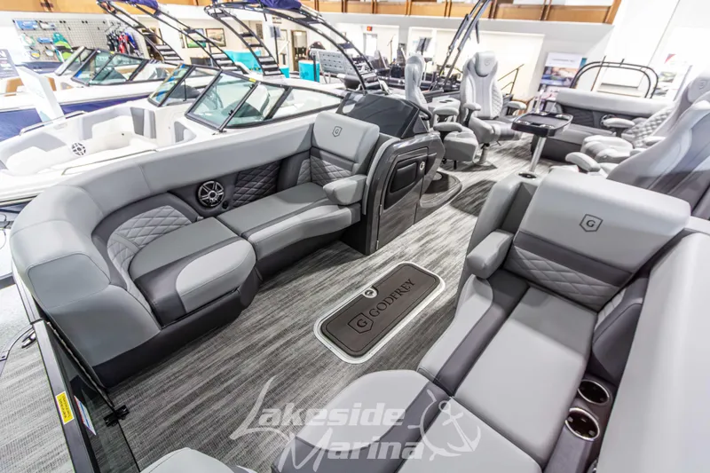 Slide: The Image of Luxurious interior of 2026 Godfrey Monaco 235 QSB pontoon boat at Lakeside Marina. - 12