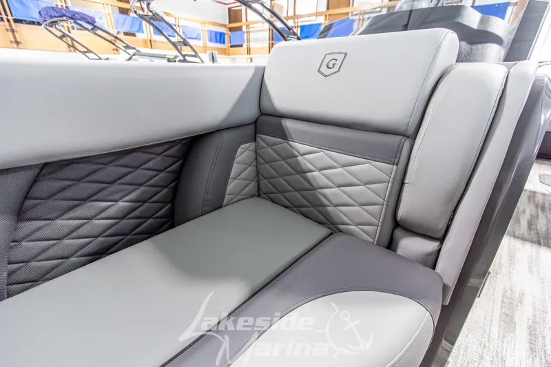 Slide: The Image of Luxurious seating on 2026 Godfrey Monaco 235 QSB boat with quilted upholstery design. - 16