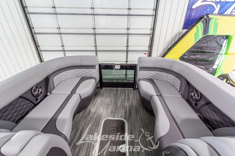 Slide: The Image of Luxurious interior of 2026 Godfrey Monaco 235 QSB pontoon boat with plush seating. - 18
